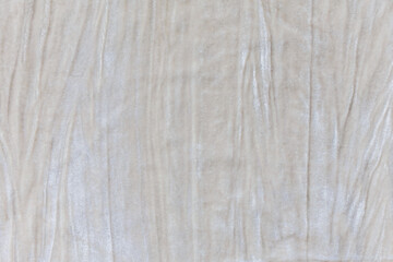 texture of velvet white beige fabric with wrinkles