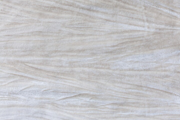 texture of velvet white beige fabric with wrinkles
