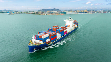 container ship sailing in sea, shipping business and industry service of cargo logistic import and export international freight transportation by container ship in open sea, aerial view