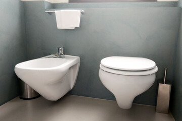 Modern Minimalist Bathroom with Wall-Mounted Toilet and Bidet - Interior Design Inspiration