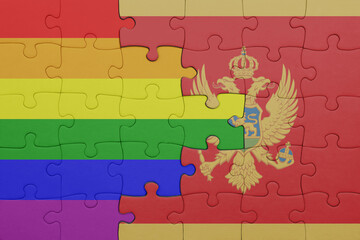 puzzle with the colourful national flag of montenegro and rainbow gay pride flag .