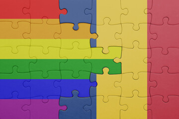 puzzle with the colourful national flag of romania and rainbow gay pride flag .