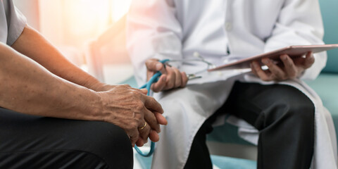 Elderly senior, old menopause elder woman patient having geriatric doctor consulting and diagnostic examining on aging and mental health care in medical clinic office or hospital examination room