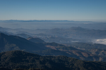  beautiful view of mountain with clouds at sunrise (Doi Inthanon National Park, Chiang Mai), soft focus
