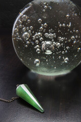 Turquoise pendulum and crystal ball for divination and enhancing psychic abilities