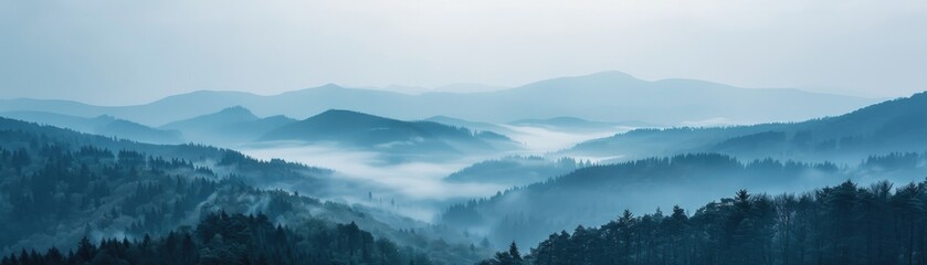 Mountain layers landscape in fog.