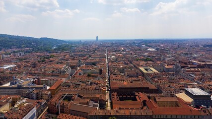 Obraz premium Cityscape with numerous red roofs, evoking a European ambiance