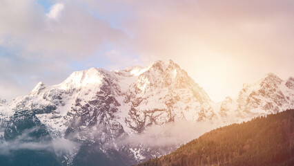 Alpine mountains. Snowcapped summit in the Alps. Beautiful landscape.