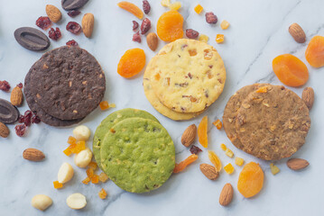 various shortbread cookies with dried fruit and nuts.