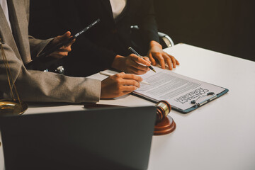 Lawyer, legal advisor, businessman brainstorming information on agreement details Business...