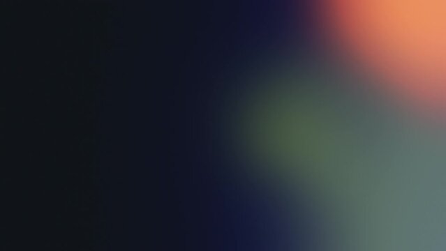 White bokeh lights move against a colorful backdrop, giving the impression of motion