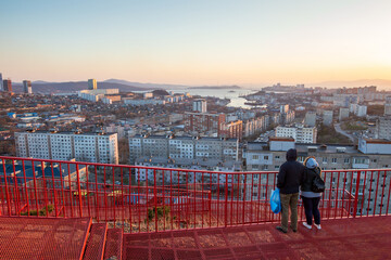 Vladivostok city, Primorsky Krai, Russia. Observation deck on the Burachka hill. People admire the...