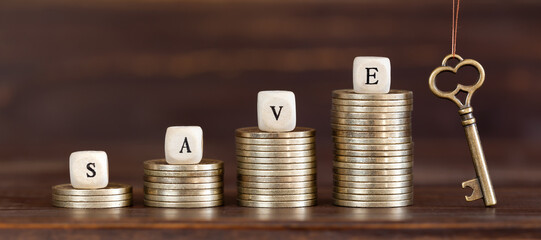 Gold coins with a key. Money savings, business success banner.