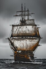 Fototapeta premium A picturesque view of a sail boat floating on calm waters. Ideal for travel and maritime concepts
