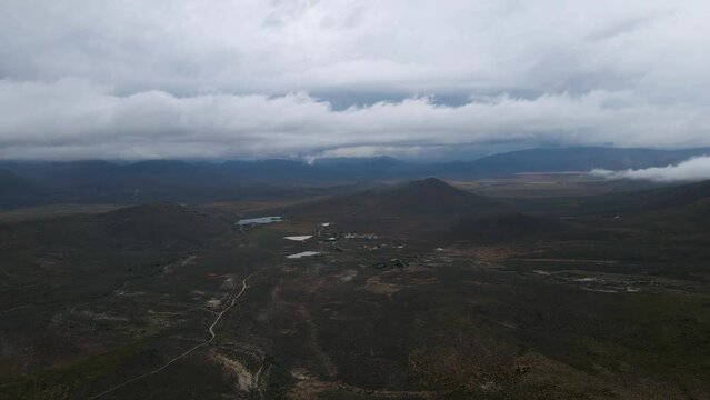 Aerial view of rugged terrain with low cloud cover, Drie Kuilen Nature Reserve, Western Cape, South Africa.