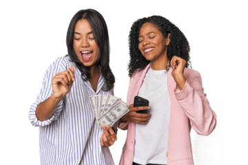 Latin businesswomen with money, phone dancing and having fun.