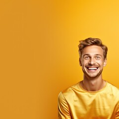 Gold background Happy european white man realistic person portrait of young beautiful Smiling man good mood Isolated on Background Banner with copyspace 