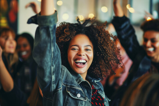 Joyful cheerful happy laughing woman having fun celebrating with her friends having a party