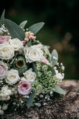 Closeup of an elegant bouquet on a stone surface