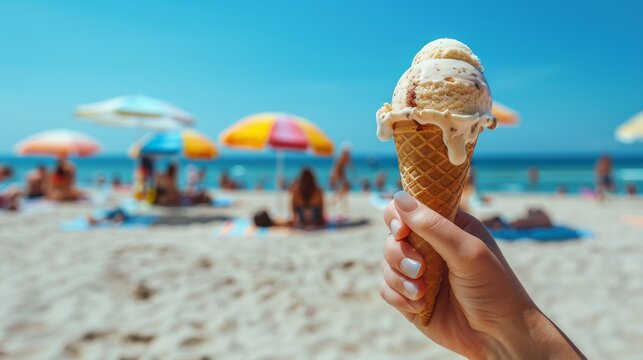 POV of Hand Holding Ice Cream Cone on Sunny Beach with vivid umbrellas, point of view summer image