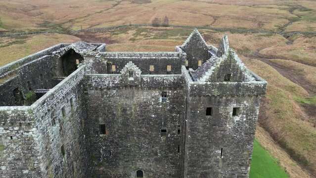 Drone footage of the Castle of Hermitage in the remote valley of the Hermitage Water, Scotland, UK