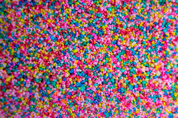 Top view of vibrant multicolored sprinkles