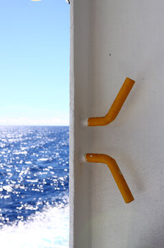 Yellow painted cleat on the deck of Cruise ship