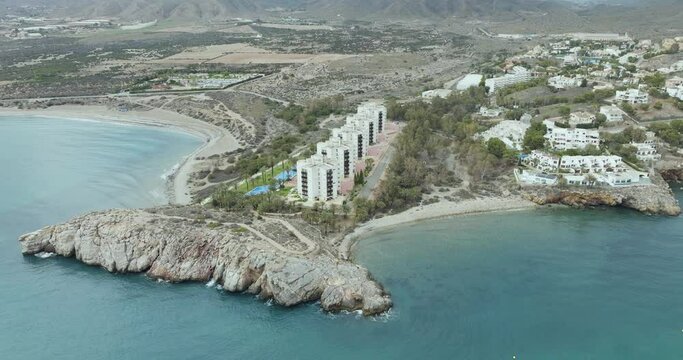 Aerial view of Cala Tabaco coastline, Isla Plana, Cartagena, Spain.