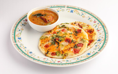 Masala Uttappam with sambhar, a south Indian healthy breakfast or teatime snack