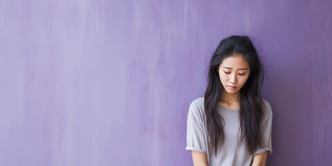 Lavender background sad Asian Woman Portrait of young beautiful bad mood expression Woman Isolated on Background depression anxiety fear burn out health issue problem mental