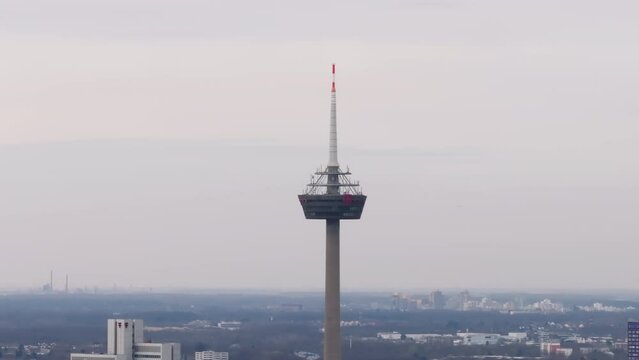 Colonius Turm Koeln telecommunication tower with Deutch Telecom logo aerial view in Cologne, Germany, cityscape background