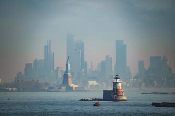 Panorama view of New York city eith statue of liberty tomorrow morning at sunrise. View from Staten...