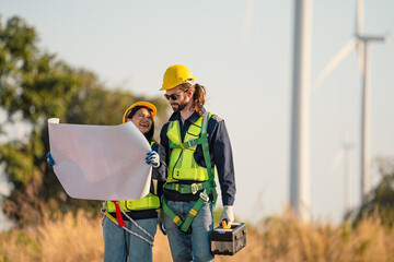 Engineers are working with wind turbines, Green ecological power energy generation, and sustainable...