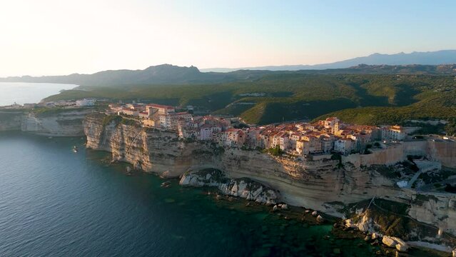 Aerial drone view of Bonifacio during sunset, Mediterranean coastal town in summer, island of Corsica, France