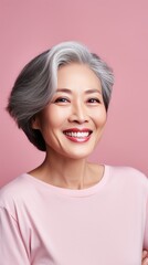 Pink background Happy Asian Woman Portrait of young beautiful Smiling Woman good mood Isolated on Background Skin Care Face Beauty 