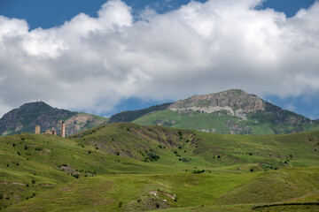 Clouds cover the peaks of the mountains. View of the Caucasus Mountains in Ingushetia, Russia