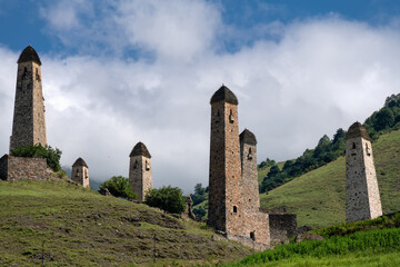 The Erzi tower complex. The ruins of an ancient city high in the mountains. Medieval battle towers built of stone to protect against attacks. Ingushetia. The North Caucasus. Russia