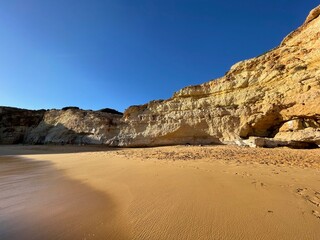 Beautiful seascape with beach, cliffs and ocean. Ferragudo, Portugal