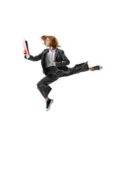 Obraz premium Leap of Success. Young woman in smart casual attire holding folder and leaping against white studio background. Concept of business, work and study, hobby, freelance, office. Ad