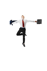 Man in business attire leaps into air with arms wide open holding briefcase and jacket against white studio background. Concept of business, work and study, freelance, movement, office. Ad