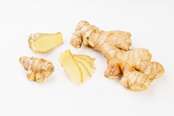 Fresh young turmeric on monochrome background