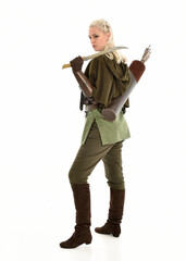 full length portrait of blonde female model wearing green fantasy elf warrior halloween costume...