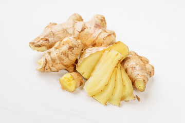 Fresh young turmeric on monochrome background