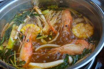 shrimp soup Tom yum kung, spicy Thai tom yum soup in white bowl