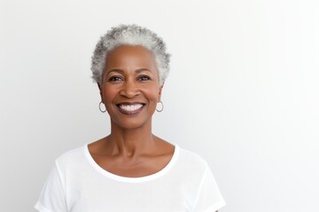 White Background Happy black american independant powerful Woman. Portrait of older mid aged person beautiful Smiling girl Isolated on Background ethnic diversity equality 