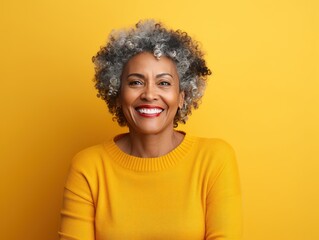 Yellow Background Happy black american independant powerful man. Portrait of older mid aged person beautiful Smiling boy Isolated on 