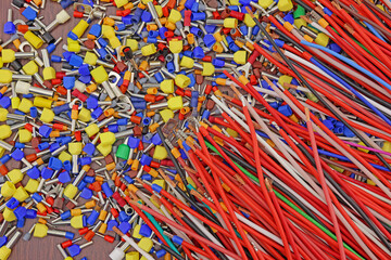 Copper electrical wiring wires in colored insulation for connecting electrical equipment. Close-up. Soft focus.