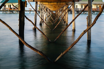  scene under a wooden bridge