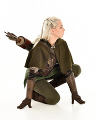 full length portrait of blonde female model wearing green fantasy elf warrior halloween costume...