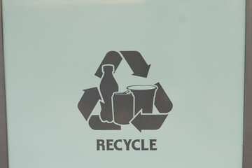 Close-up on recycle sign, horizontal